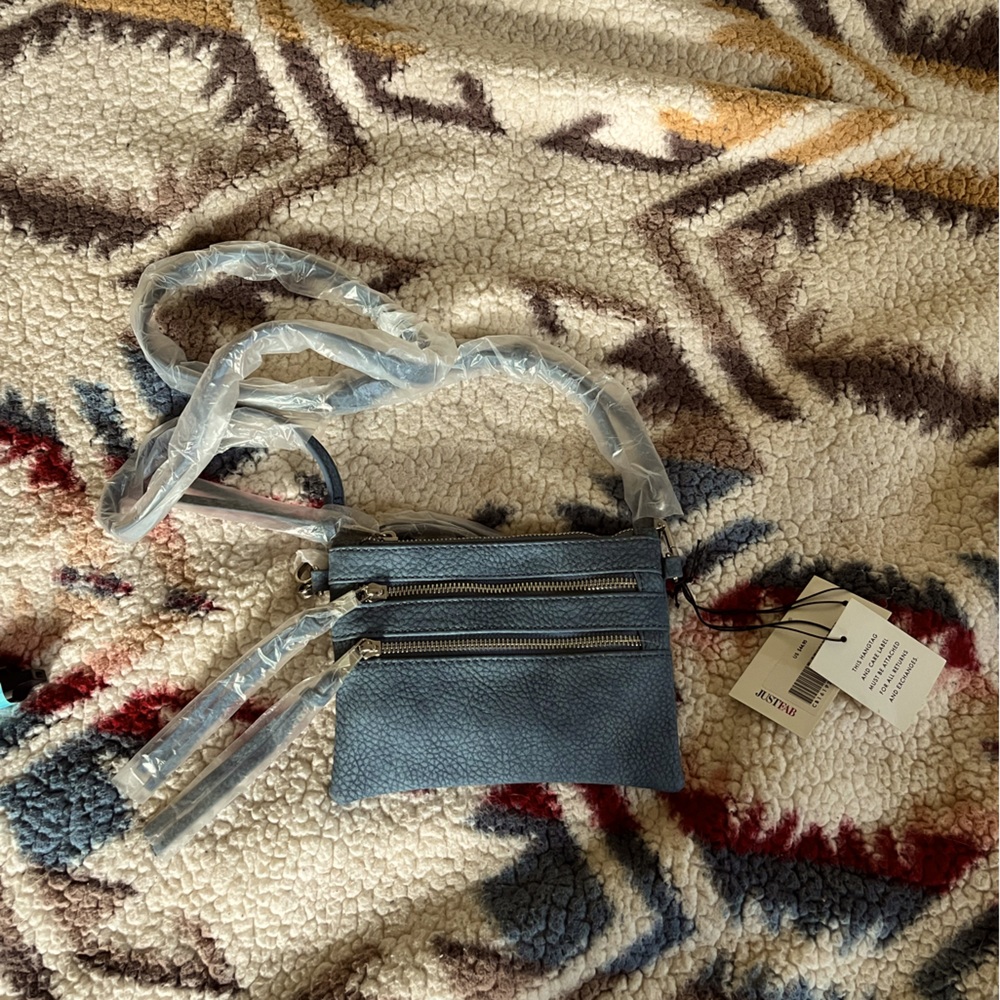 Adorable small blue handbag.